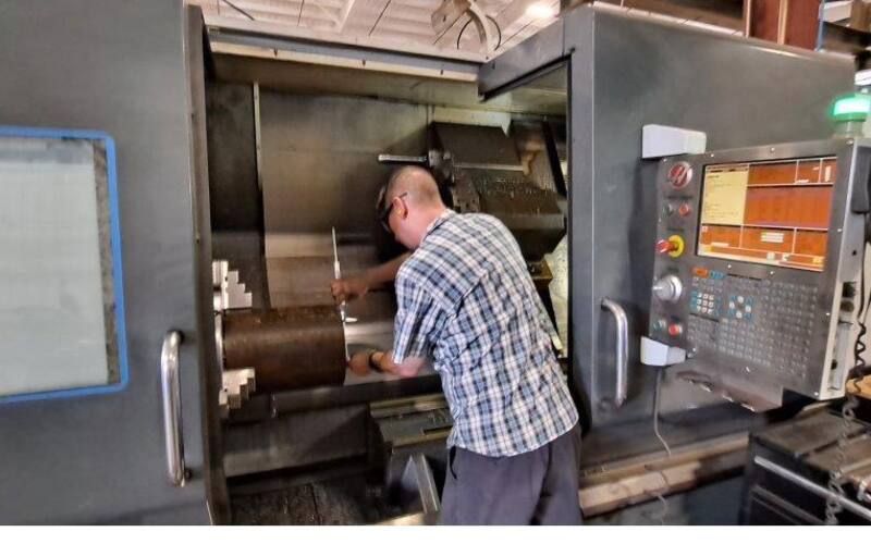 CNC lathe operator at Haas machine
