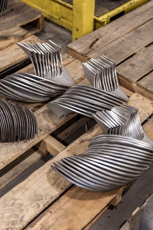 Formed screw conveyor flights