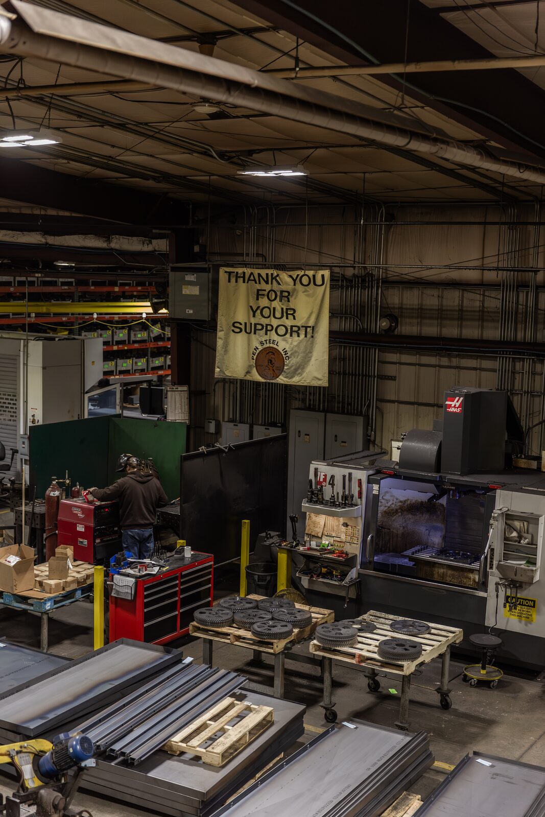TIG welding bay and Haas VF4 machining center