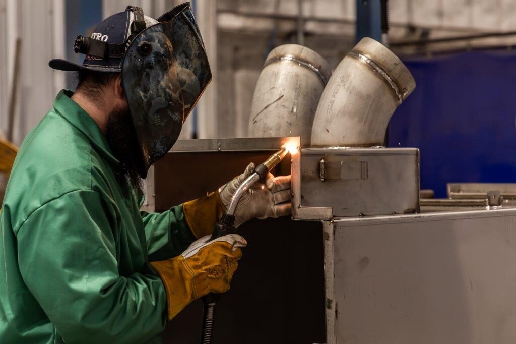 Hand welding a stainless steel assembly