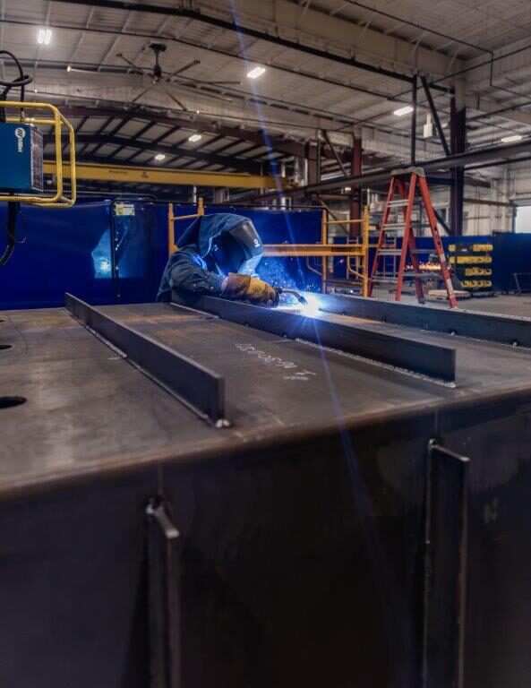 Welder working on a VanTran tank