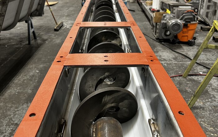Screw conveyor trough with screw flighting